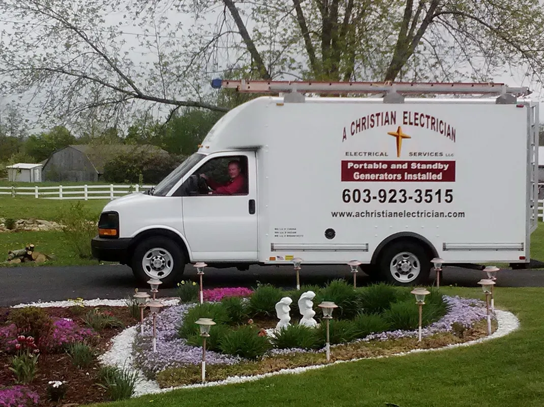 A Christian Electrician box truck lettered 'Portable and Standby Generators Installed'
